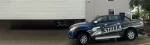 Stella company vehicle in front of warehouse